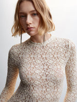 Long-sleeved lace-trimmed top